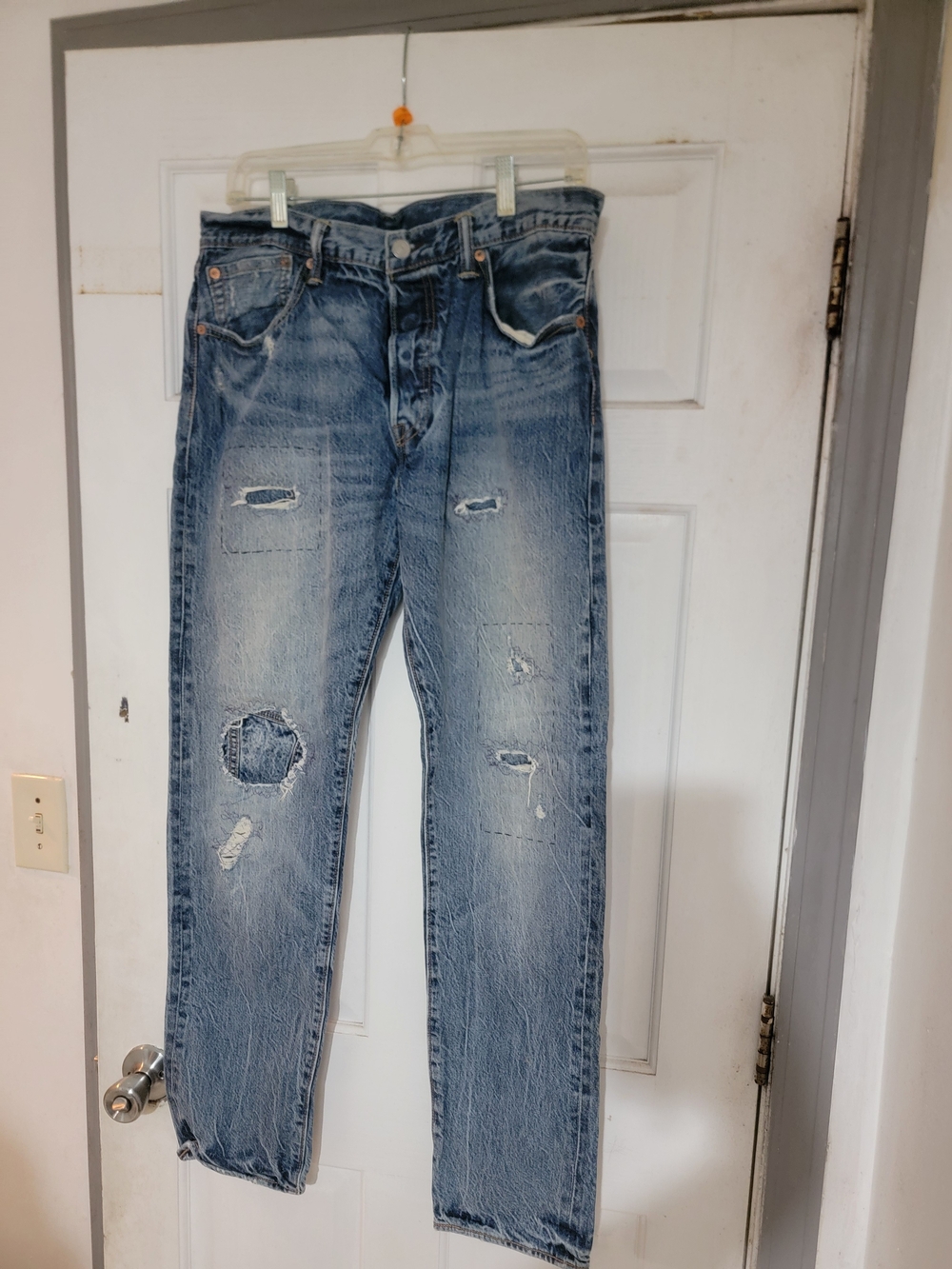 Relaxed Light Blue Distressed Men's Jeans